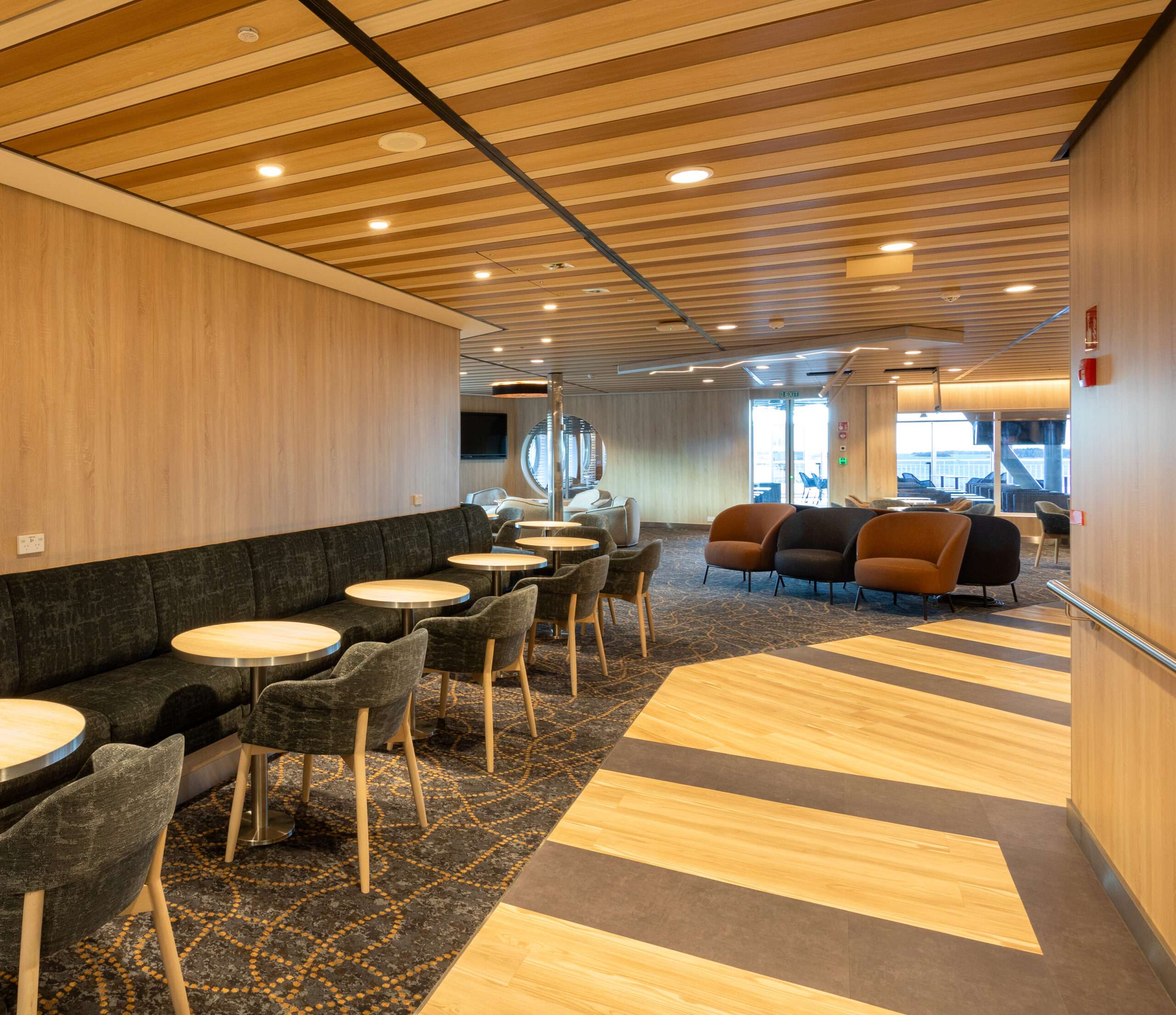 Interval panels with wood-effect finishes in the lounge onboard Spirit of Tasmania.
