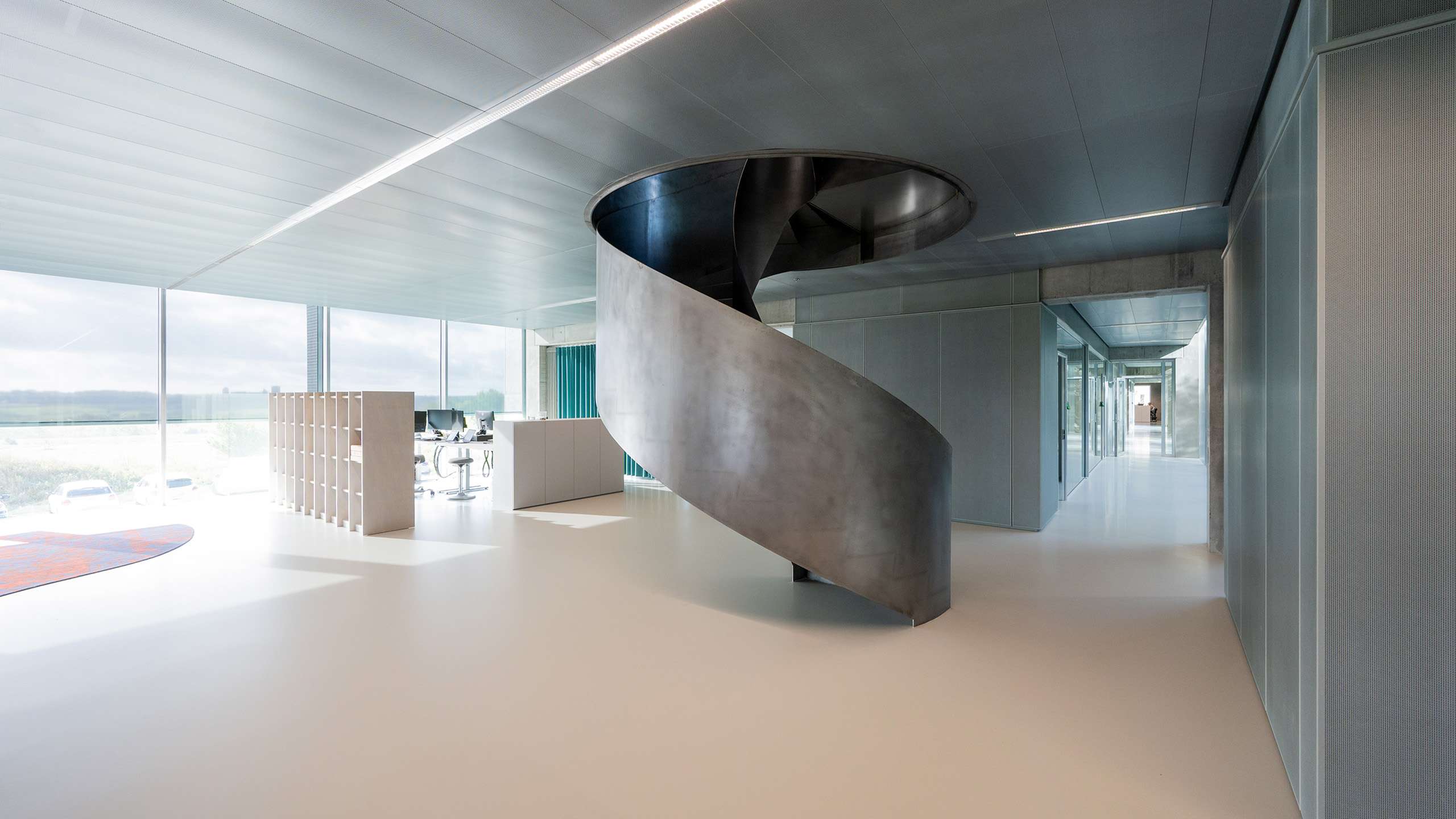 Raw concrete and metal ceiling